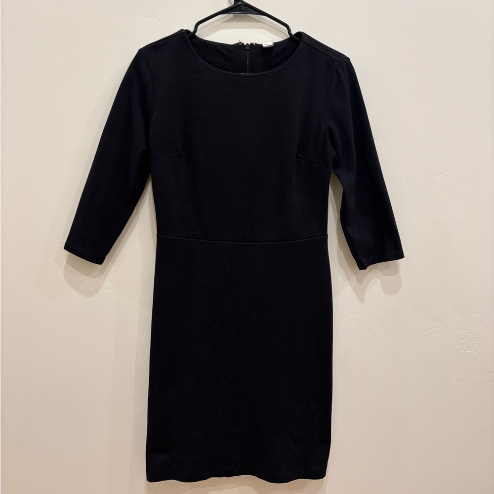 Form fitting black mini dress